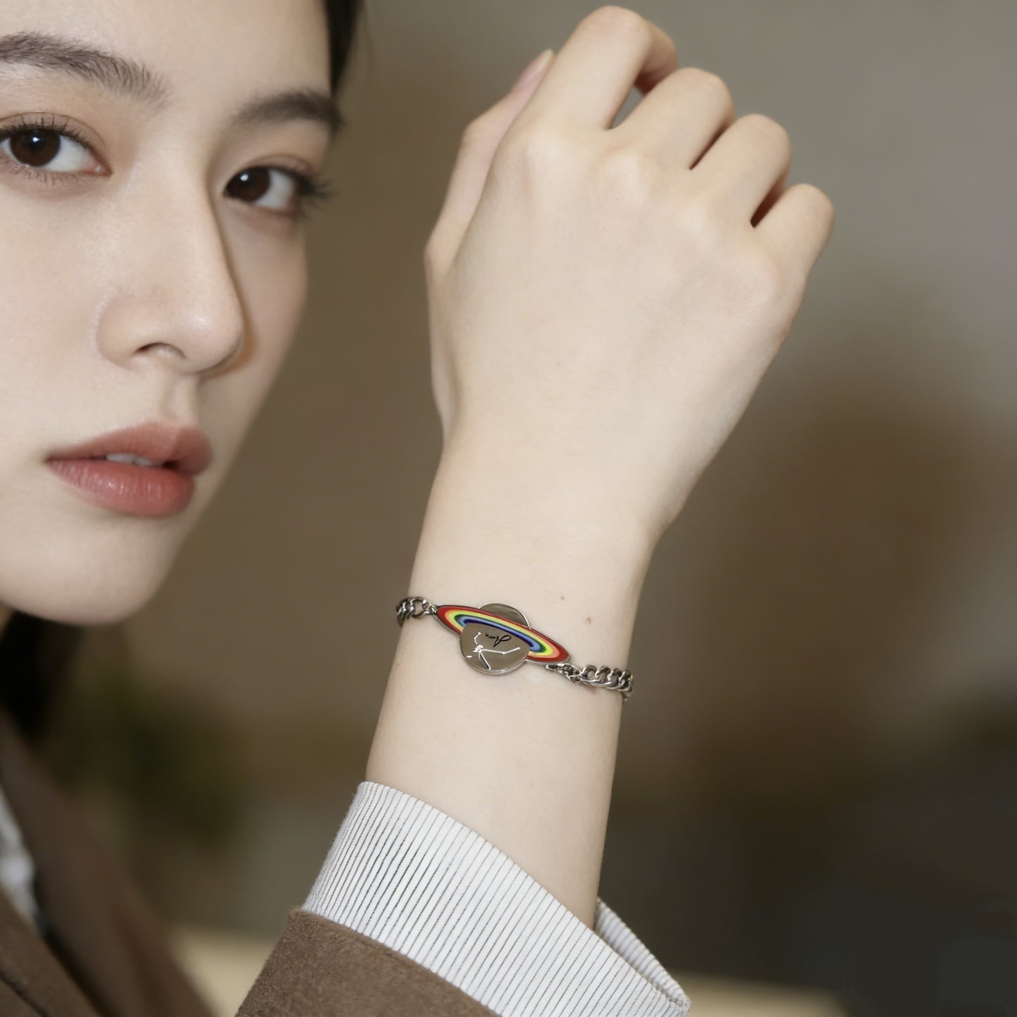 OUTR Orbit Reign Bracelet, symbolic LGBTQ accessory detail