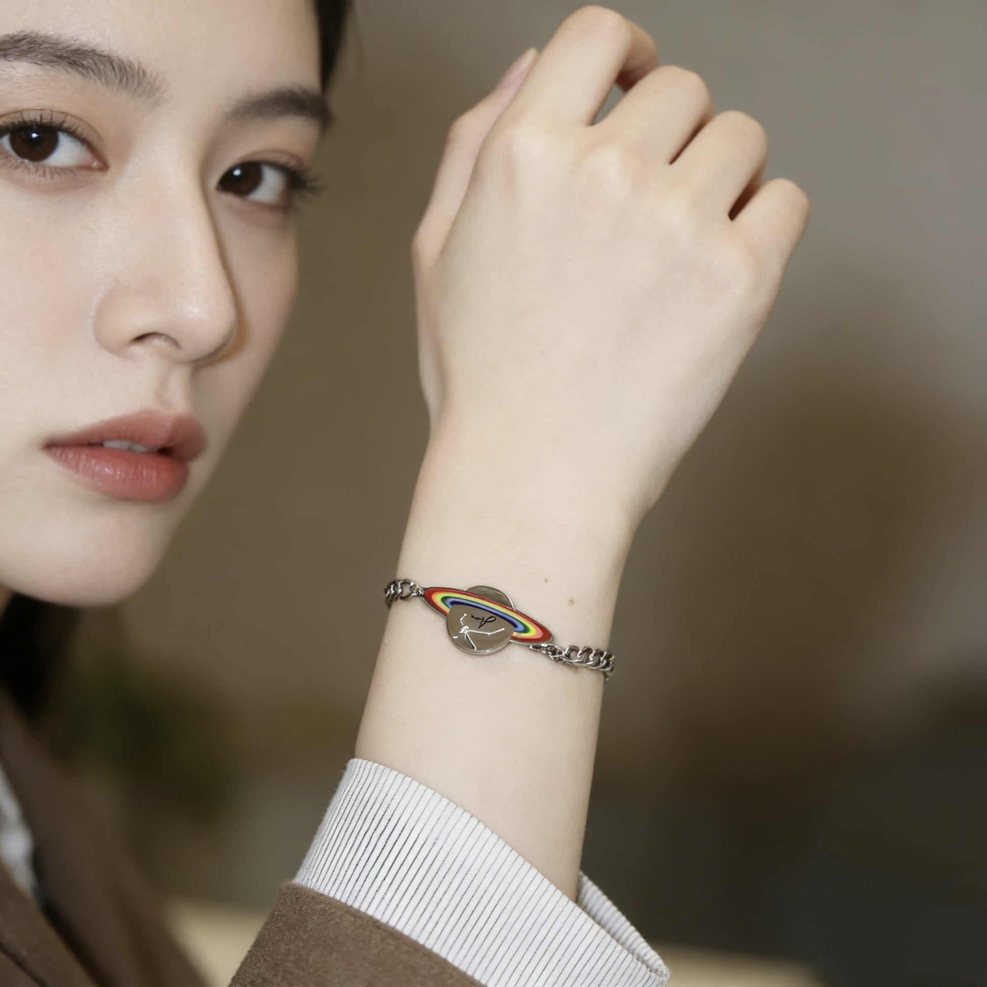 OUTR Orbit Reign Bracelet, symbolic LGBTQ accessory detail