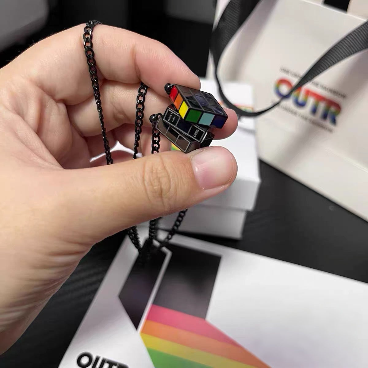 OUTR Recode Cube Necklace, inclusive jewelry styling image