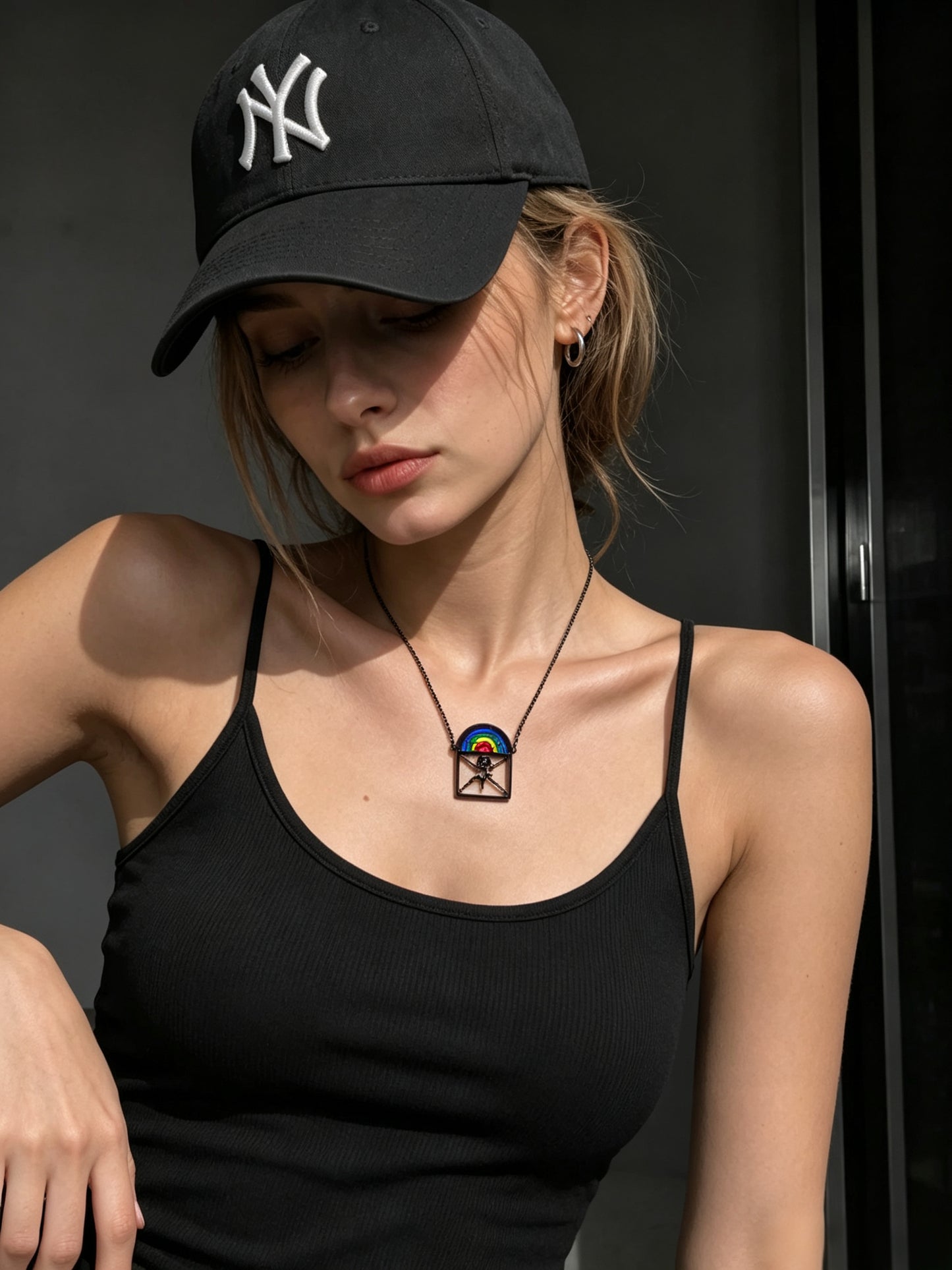 OUTR Rainbow Cage Necklace, meaningful self-expression jewelry