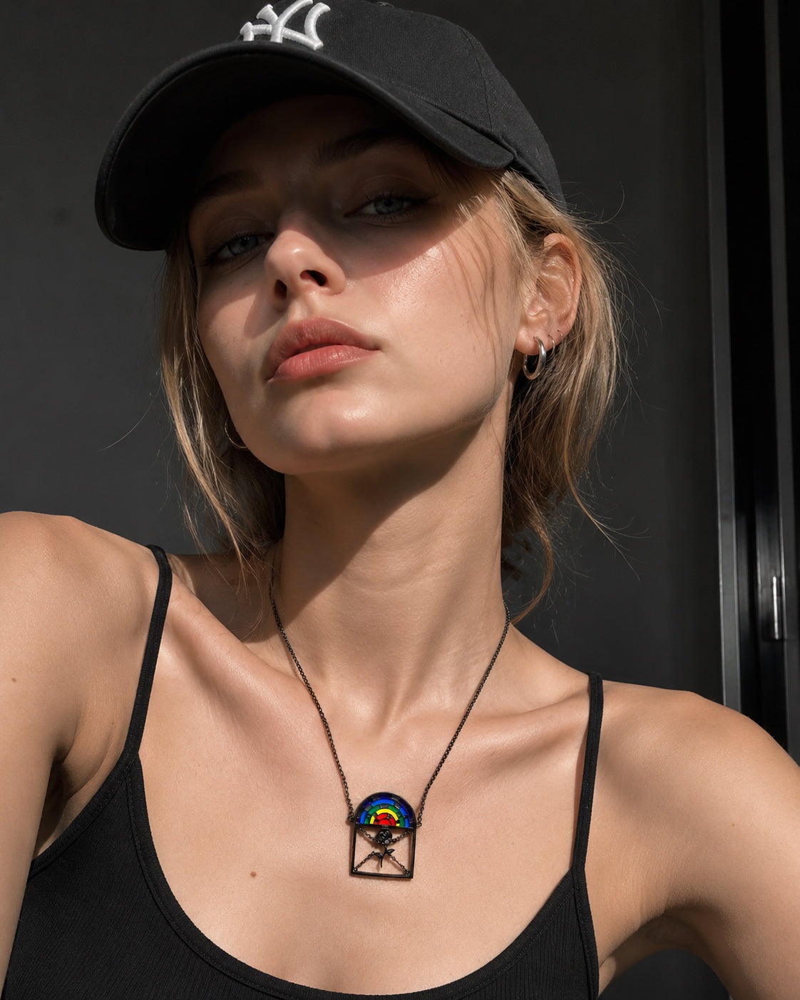 OUTR Rainbow Cage Necklace, Pride-inspired necklace close-up