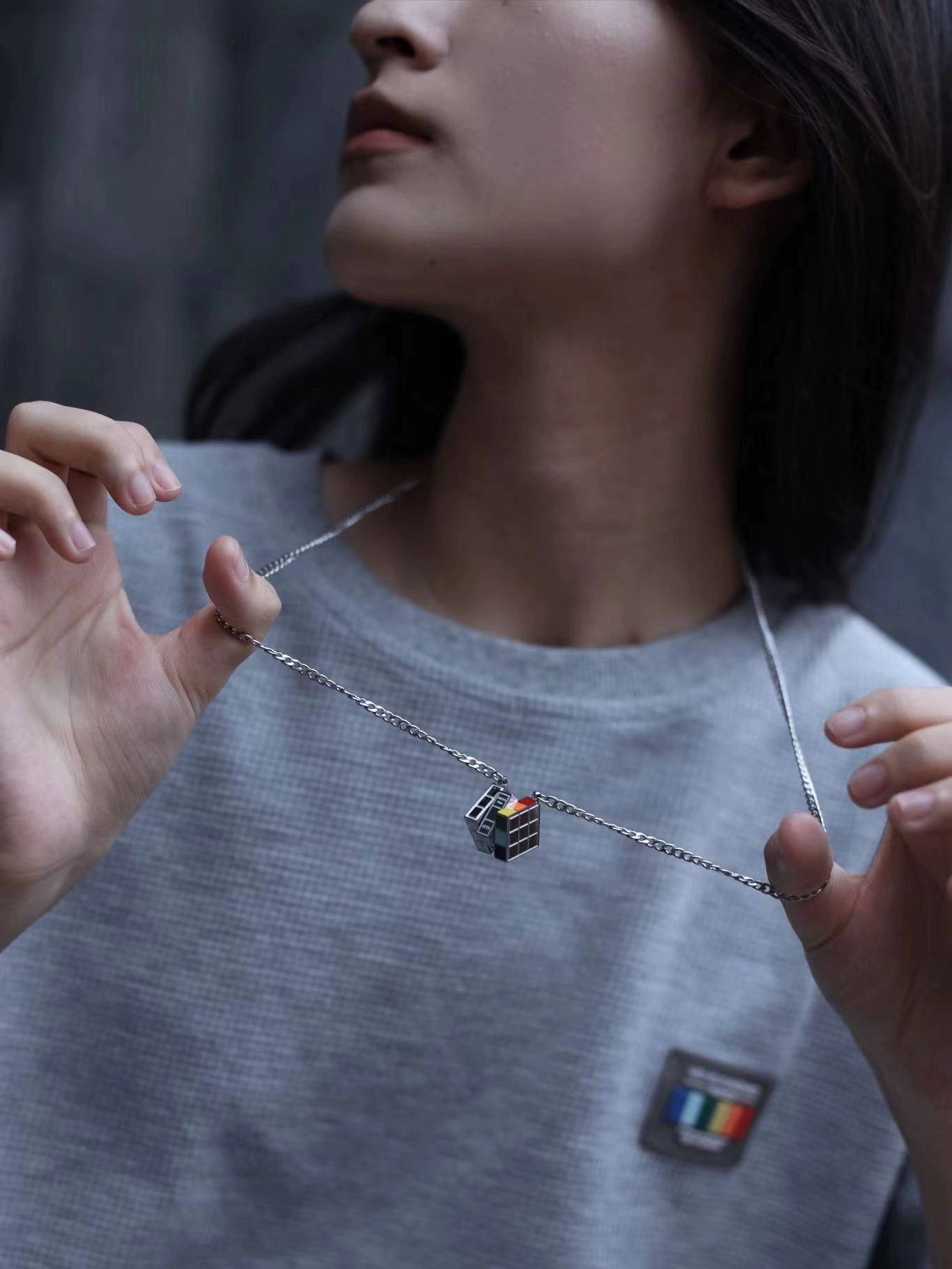 OUTR Recode Cube Necklace, modern LGBTQ accessory image