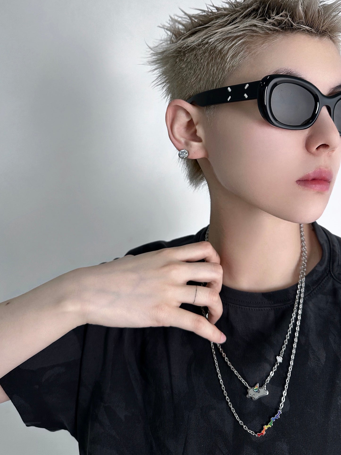 OUTR Puppy and Bones Necklace For LGBTQ, modern inclusive accessory detail