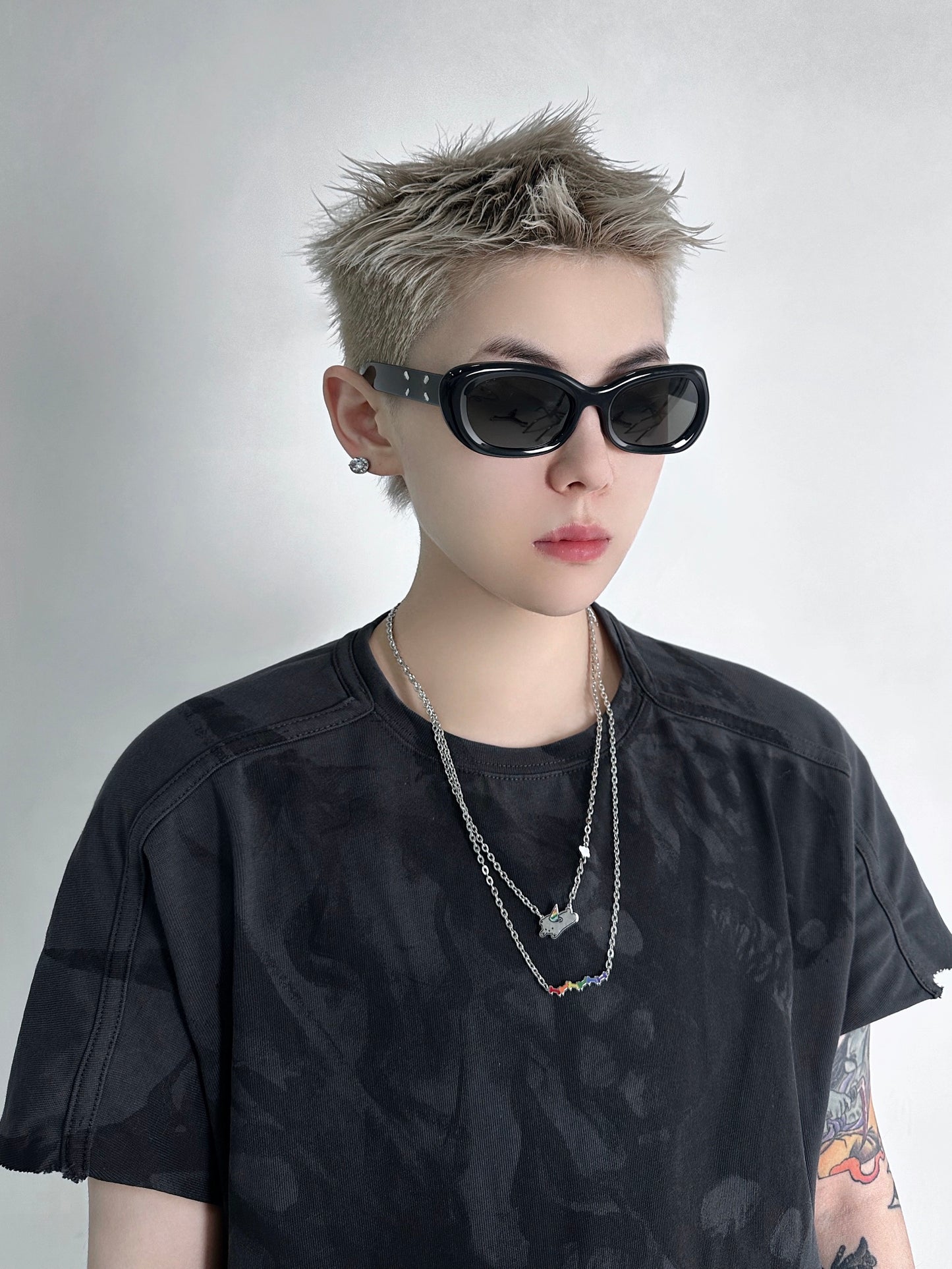 OUTR Puppy and Bones Necklace For LGBTQ, queer jewelry styling image
