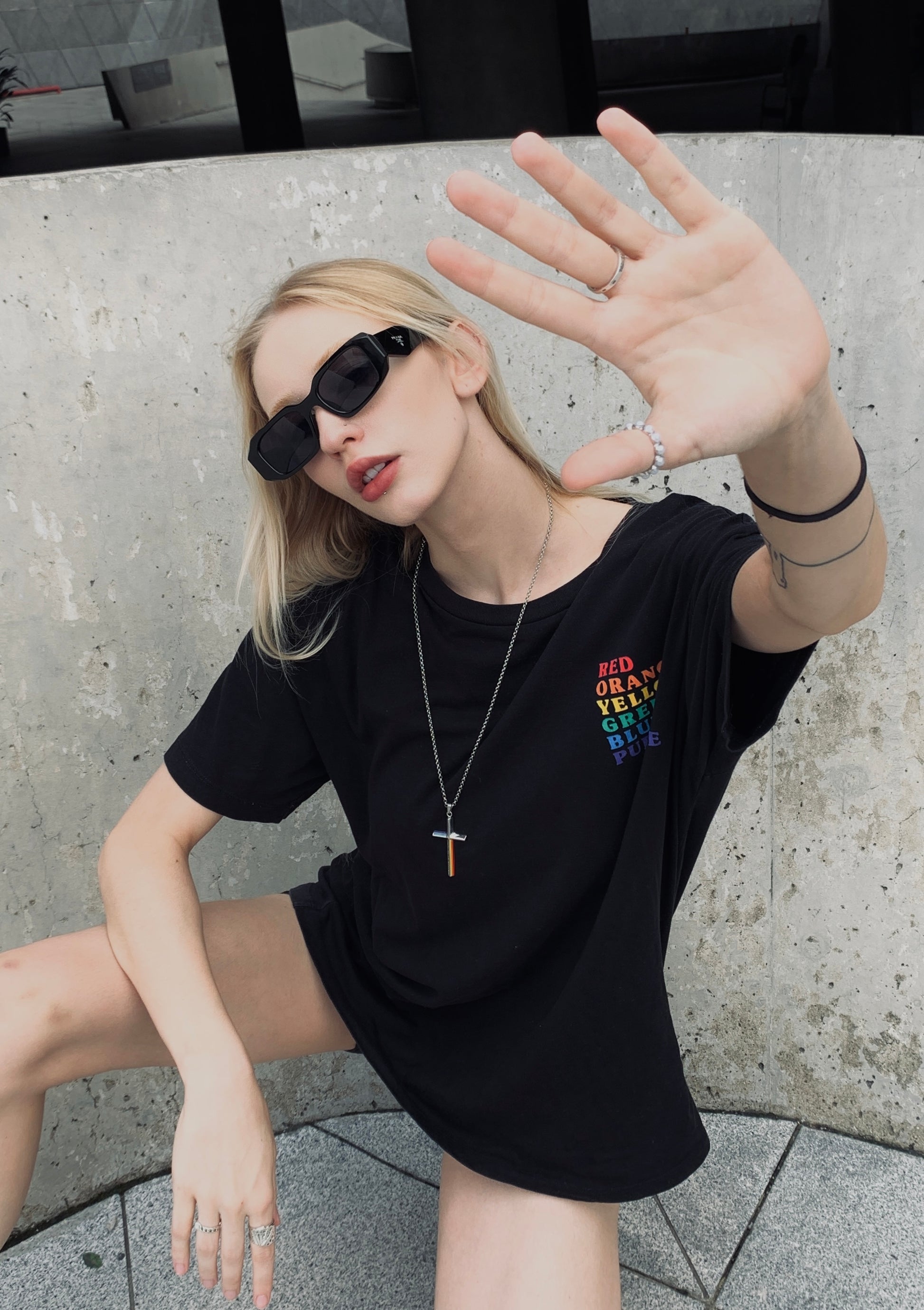 OUTR Beyond Cross Necklace, inclusive accessory styling image
