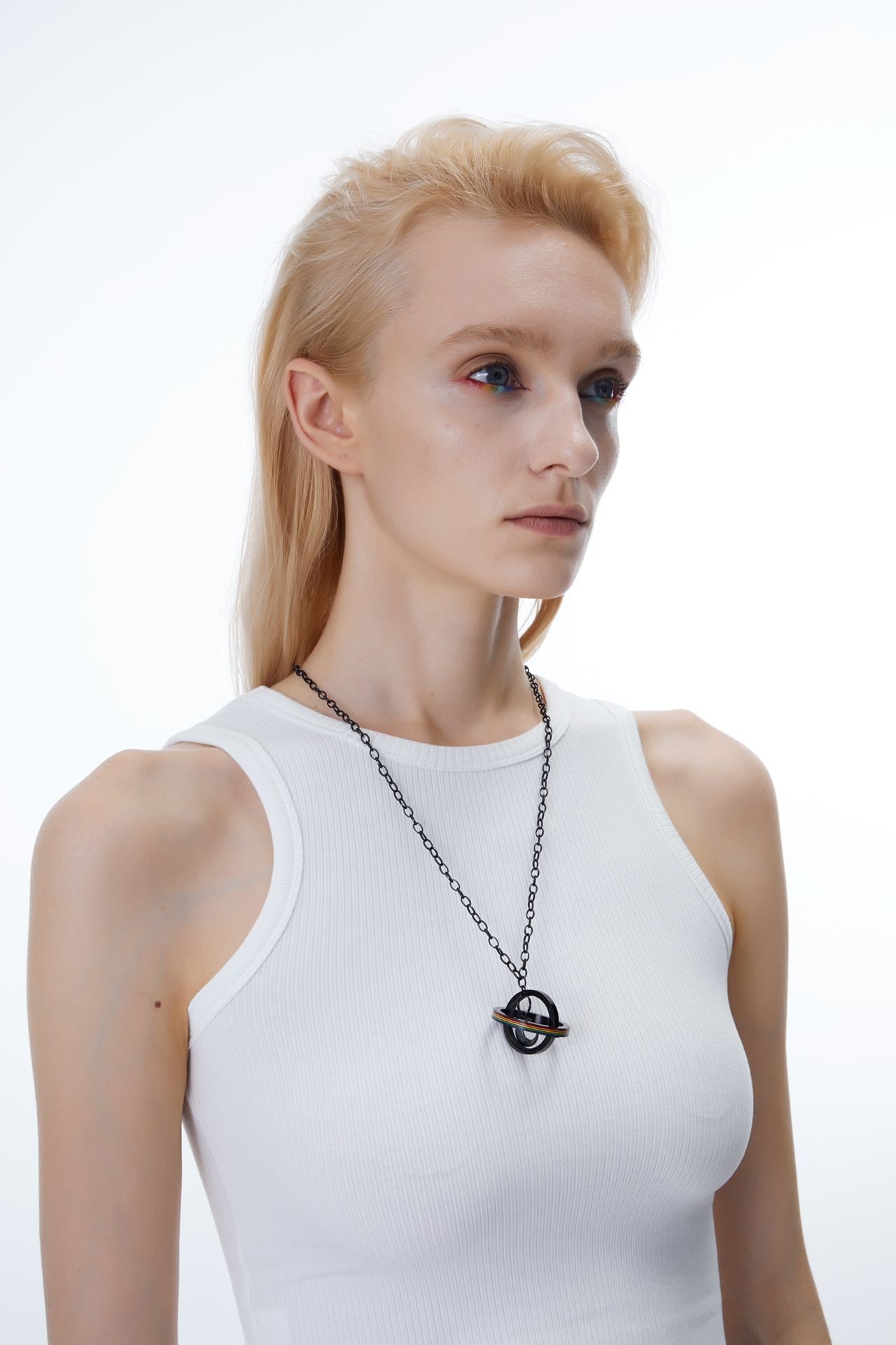 OUTR Lunar Orbit Necklace, queer jewelry close-up image